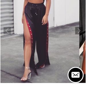 Meshki Black with Red trim snap/ “popper” pants